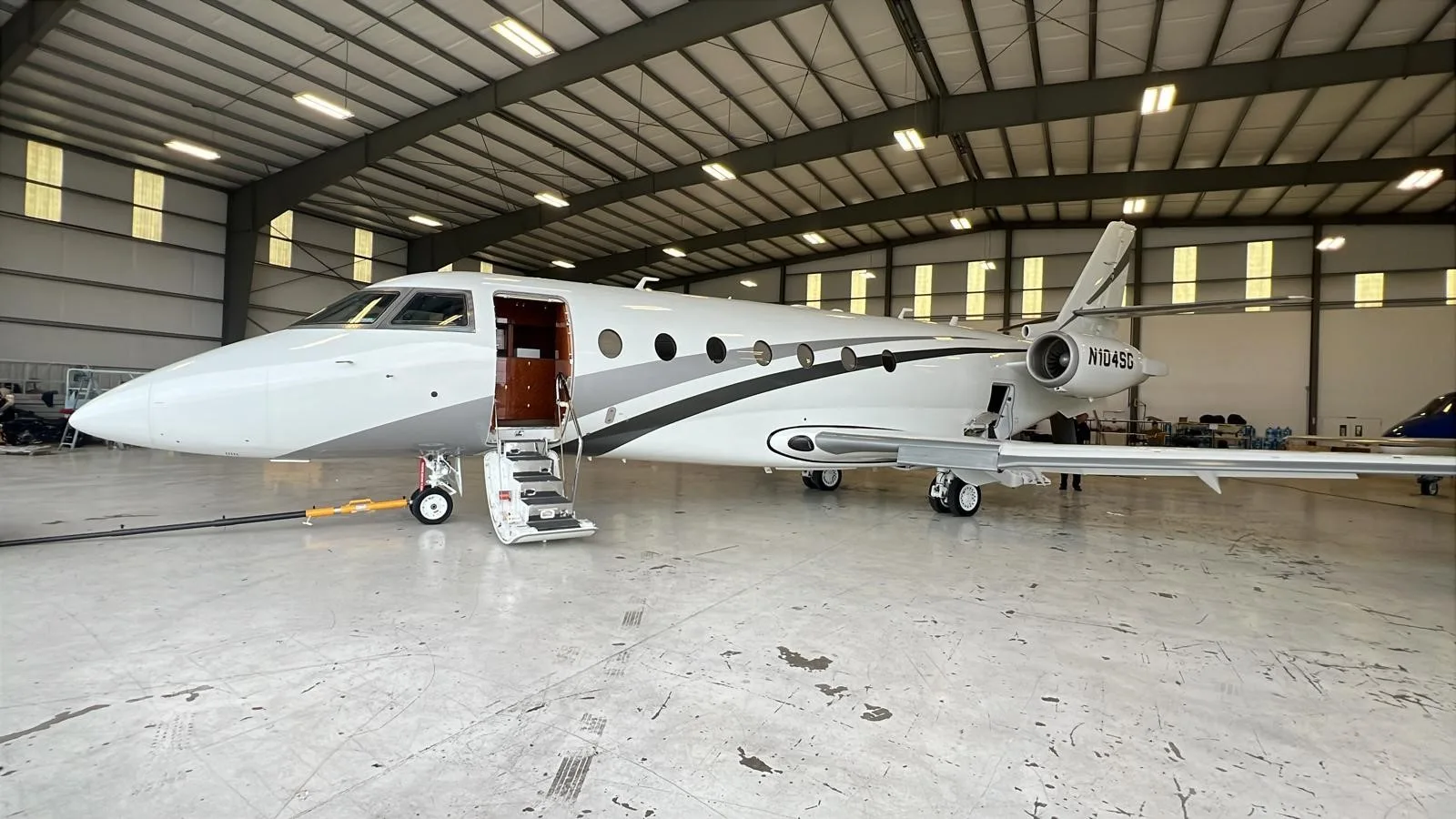 Exterior view of a 2009 GULFSTREAM G200, N104SG.