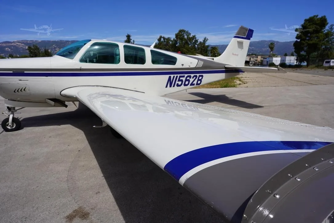 Exterior view of a 1989 BEECHCRAFT F33A BONANZA, N1562B.