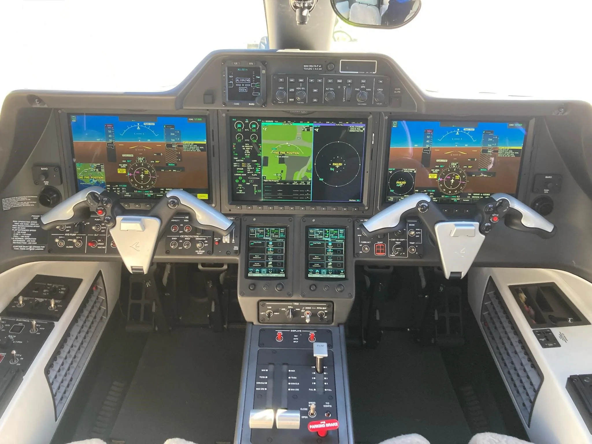 Cockpit and instrument panel of a 2023 EMBRAER PHENOM 300E.