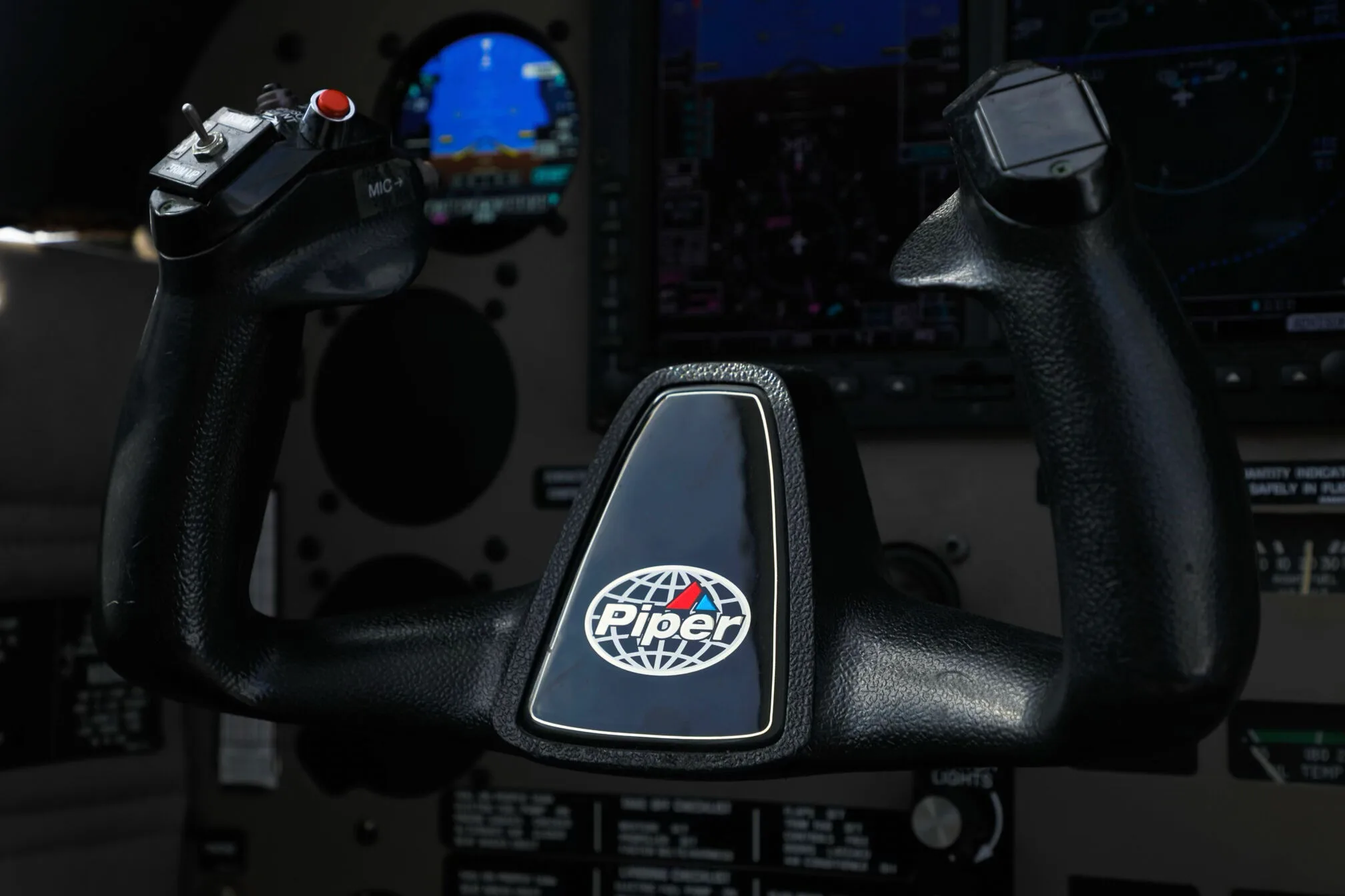 Cockpit and instrument panel of a 2014 Piper Arrow III.