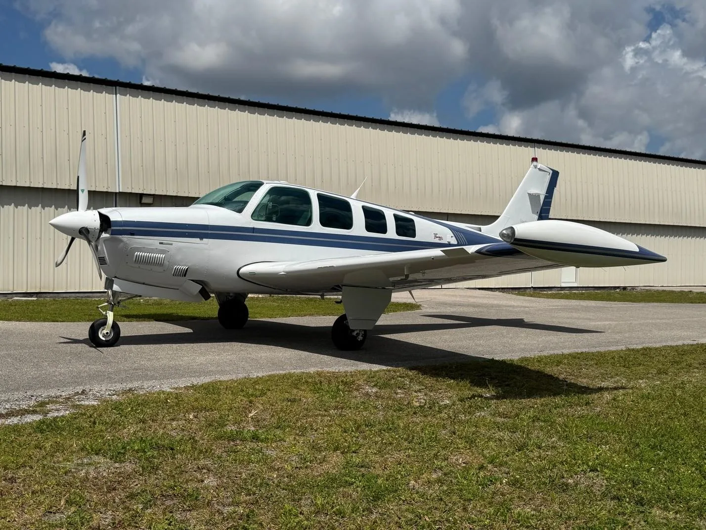 Exterior view of a 1997 BEECHCRAFT A36 BONANZA, N457DT.
