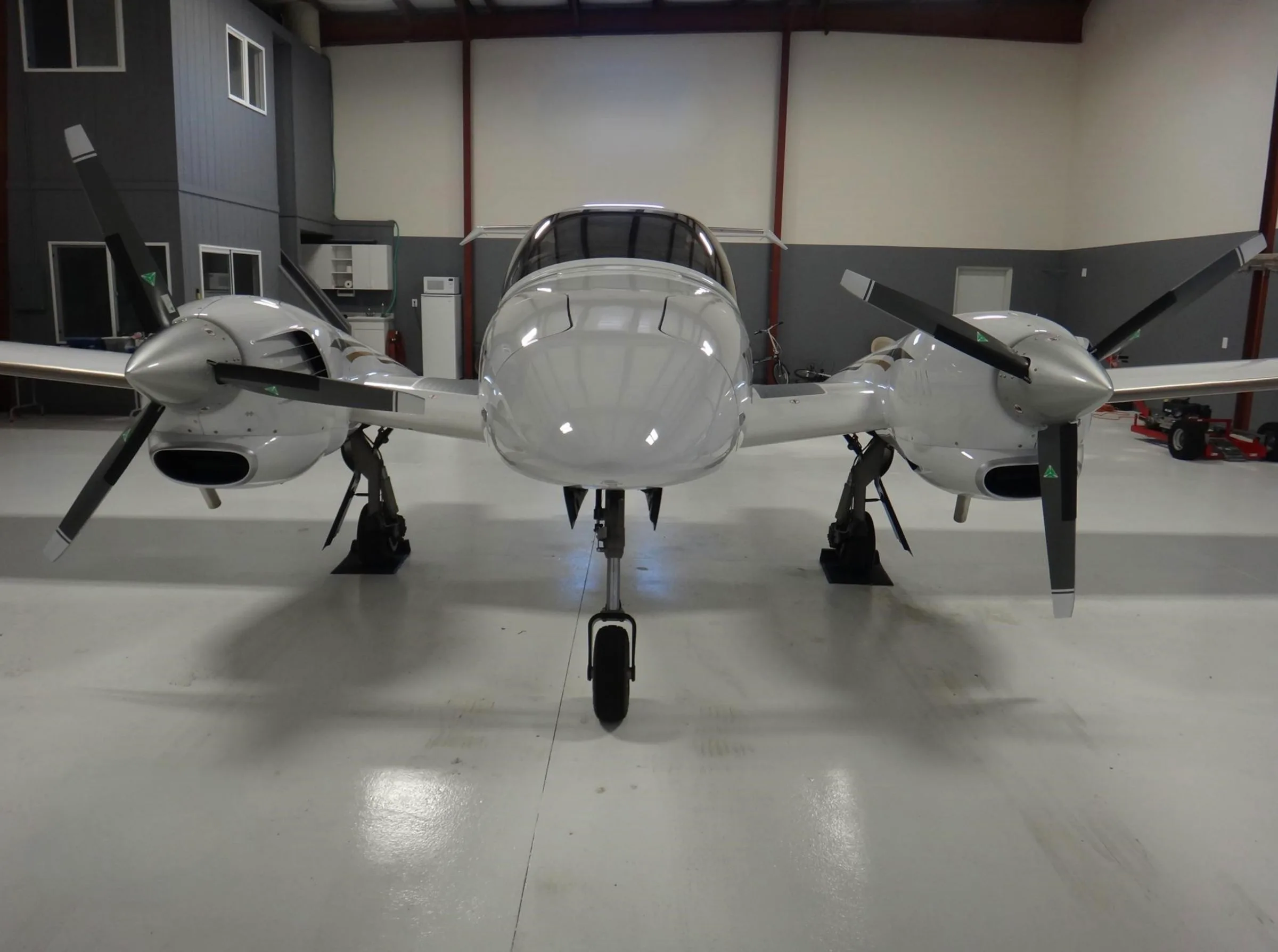 Exterior view of a 2007 Diamond DA42 Twin Star, G-COMS.