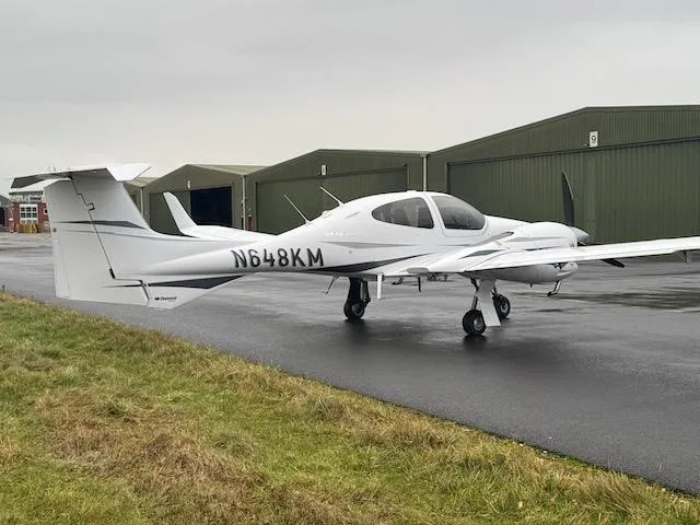 Exterior view of a 2008 DIAMOND DA42 TDI, N618KM.