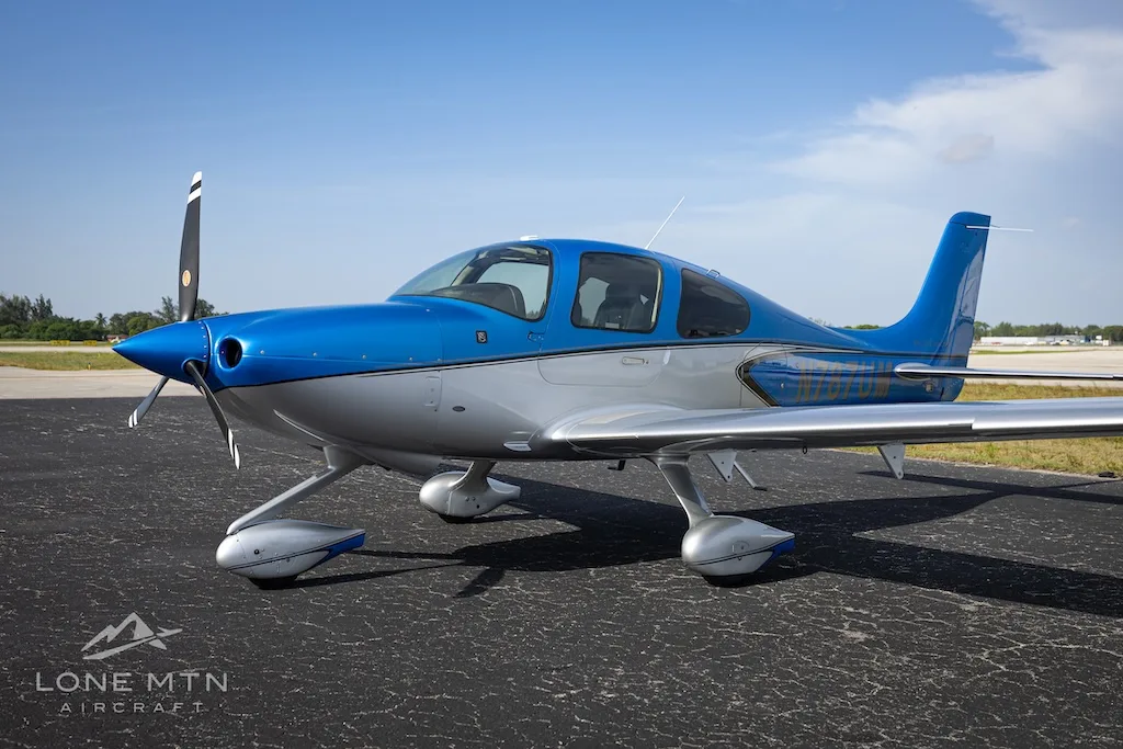 Exterior view of a 2021 Cirrus SR20 G6, N787UM.