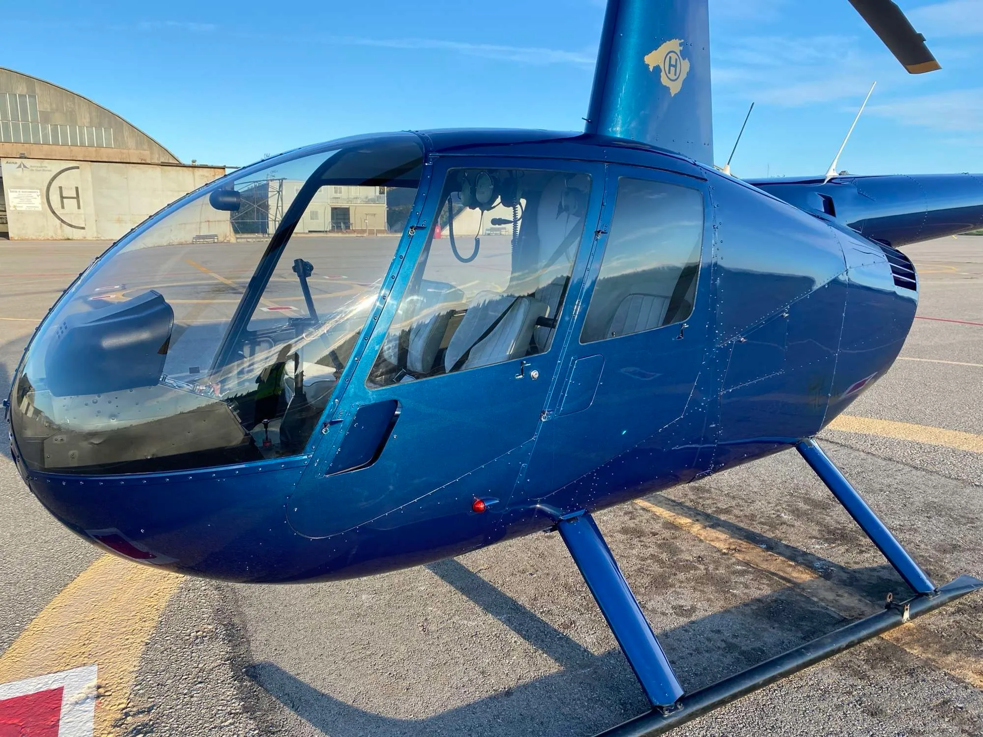 Exterior view of a 2002 Robinson R44 Raven I.