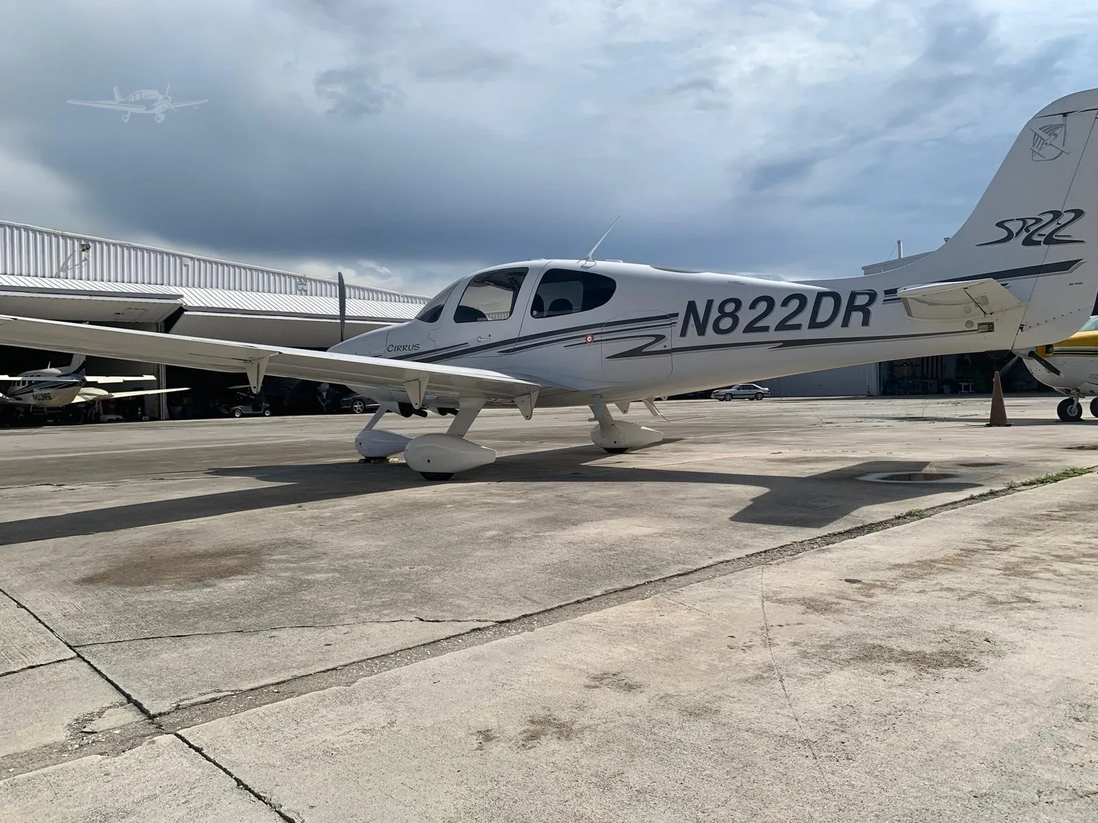 Exterior view of a 2003 CIRRUS SR22, N822DR.