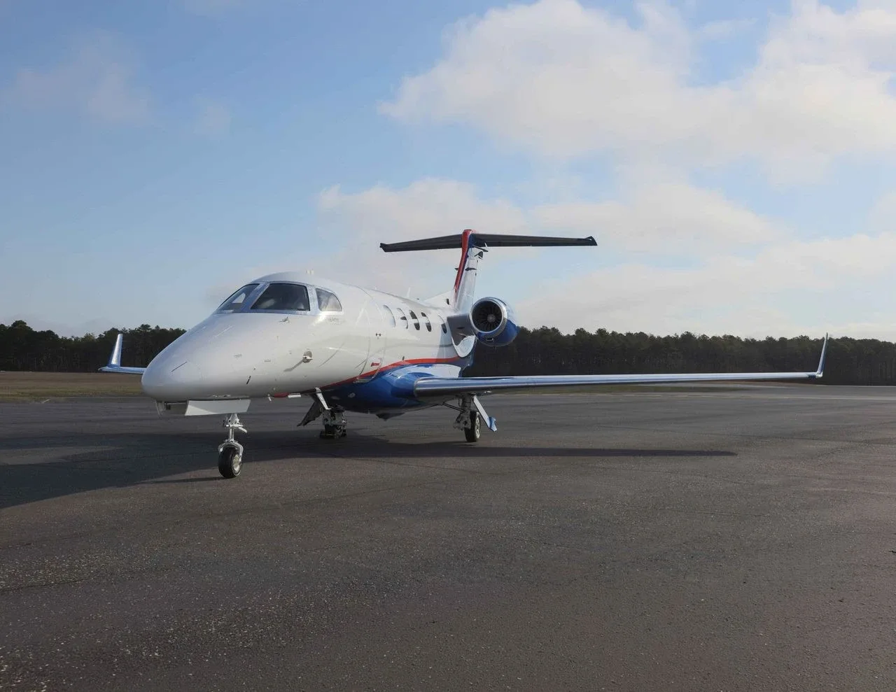 Exterior view of a 2022 Embraer Phenom 300E.