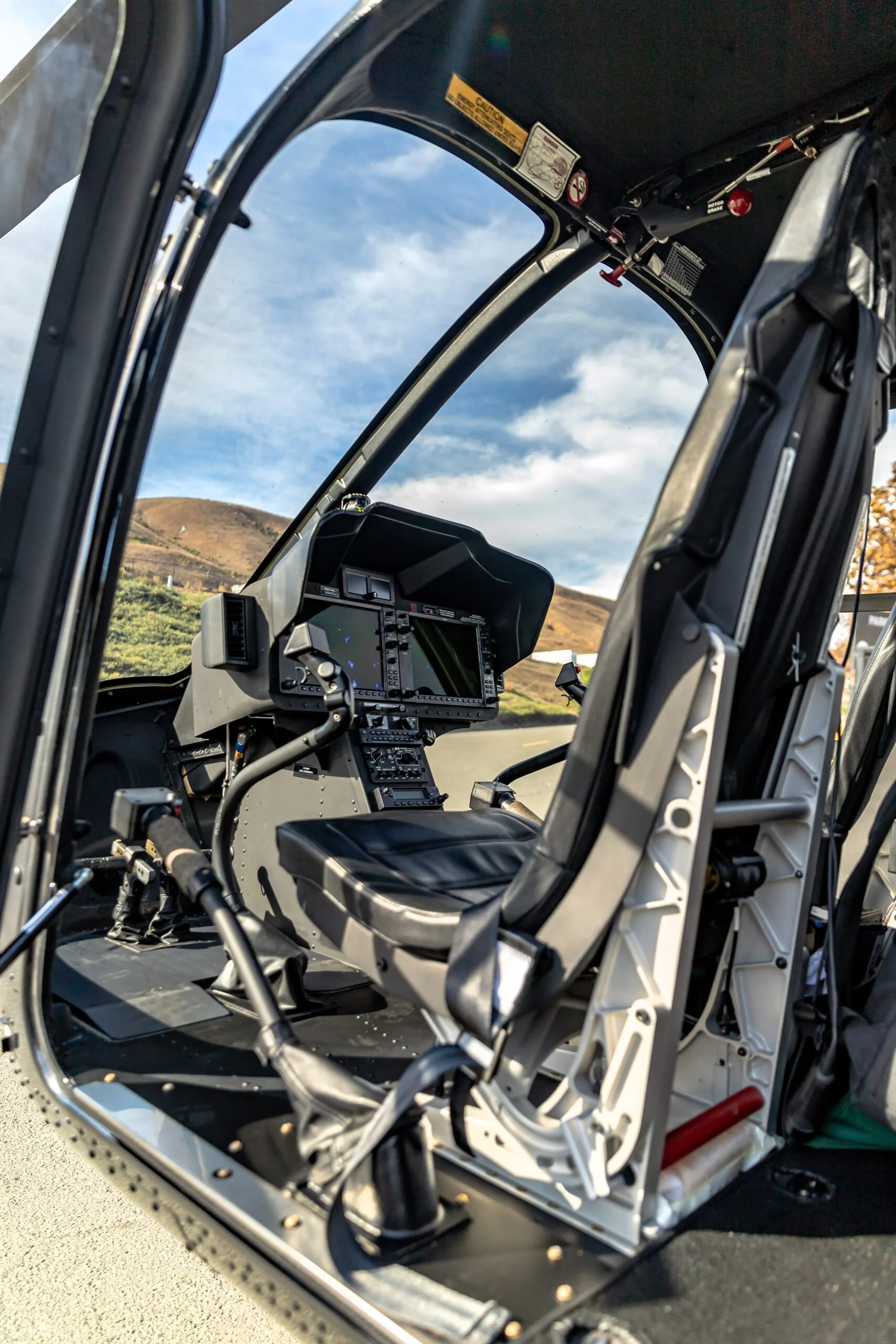 Cockpit and instrument panel of a 2019 Bell 505 Jet Ranger X.