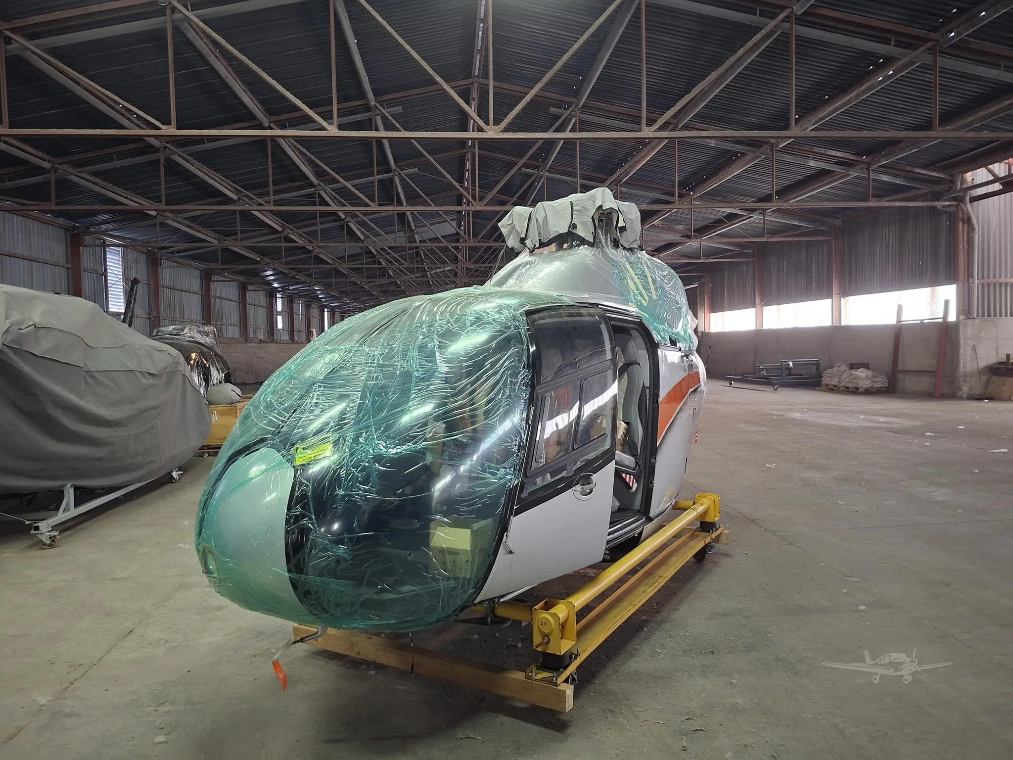 Exterior view of a 2001 EUROCOPTER EC120, OO-TRF.