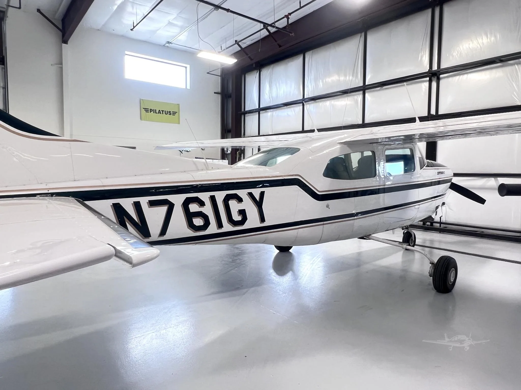 Exterior view of a 1977 CESSNA TURBO 210M, N761GY.