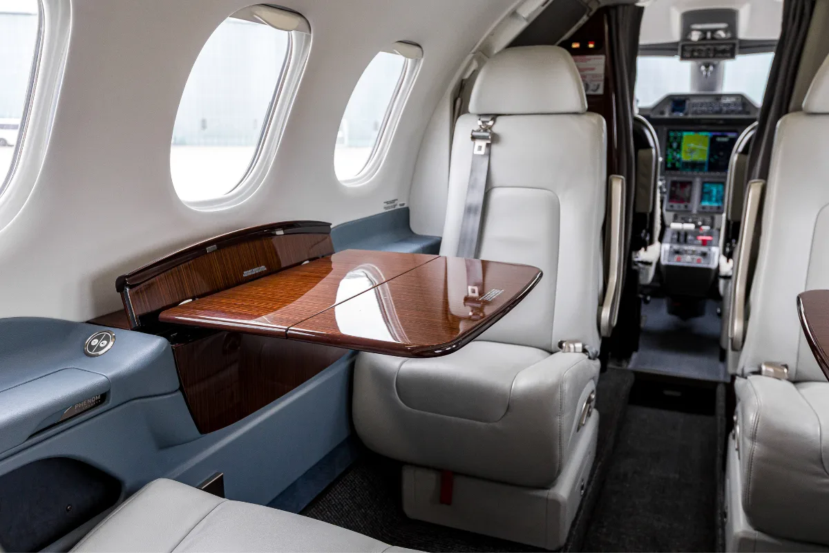 Cabin interior of a 2023 Embraer Phenom 100EV.
