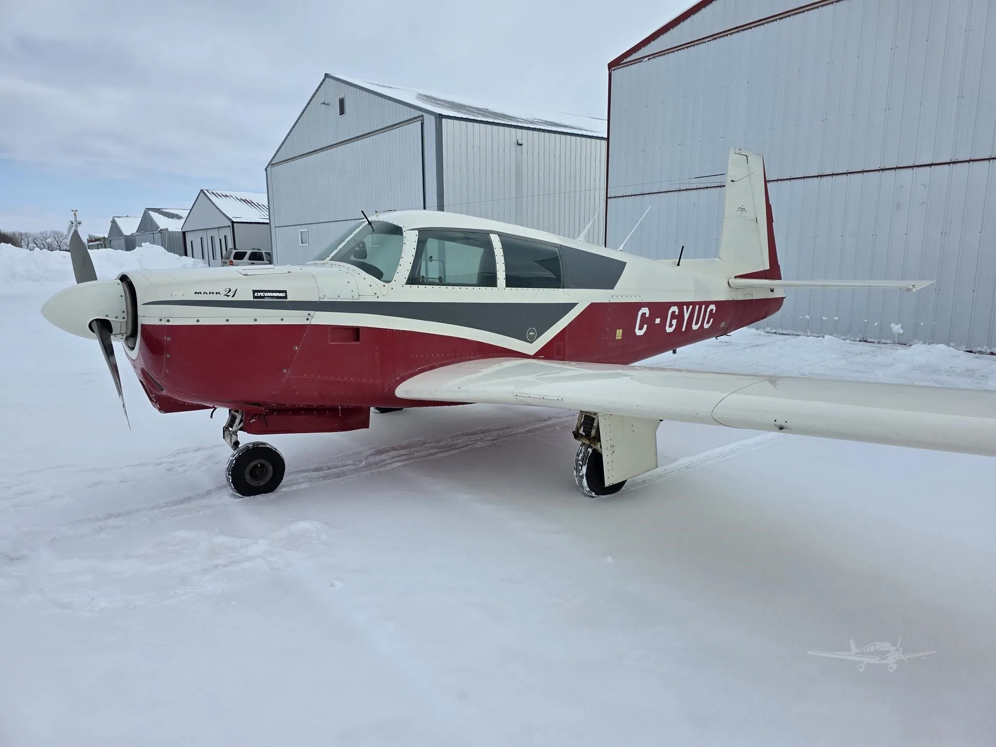 Exterior view of a 1966 MOONEY M20C MARK 21, C-GYUC.