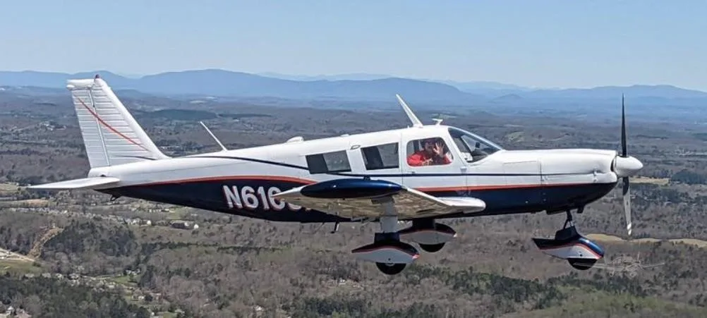 Exterior view of a 1967 PIPER CHEROKEE 6/300, N616JP.