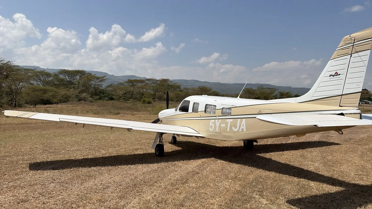 Exterior view of a 1999 Piper Saratoga, 5Y-TJA.