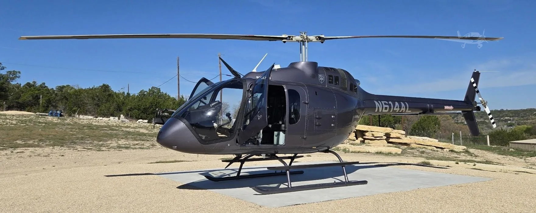 Exterior view of a 2025 BELL 505 JET RANGER X, N614AL.
