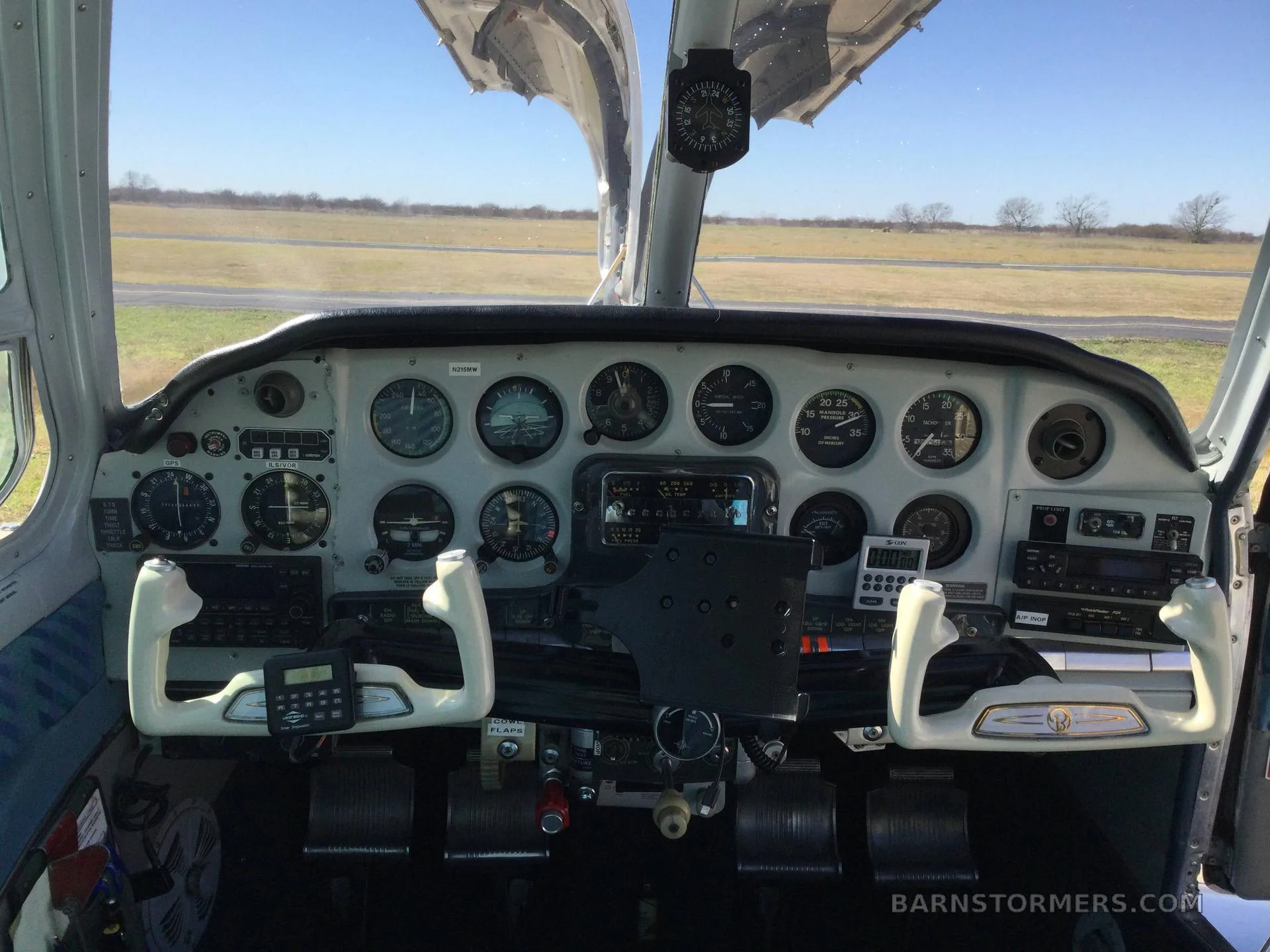 Cockpit and instrument panel of a 1956 Beechcraft BONANZA.