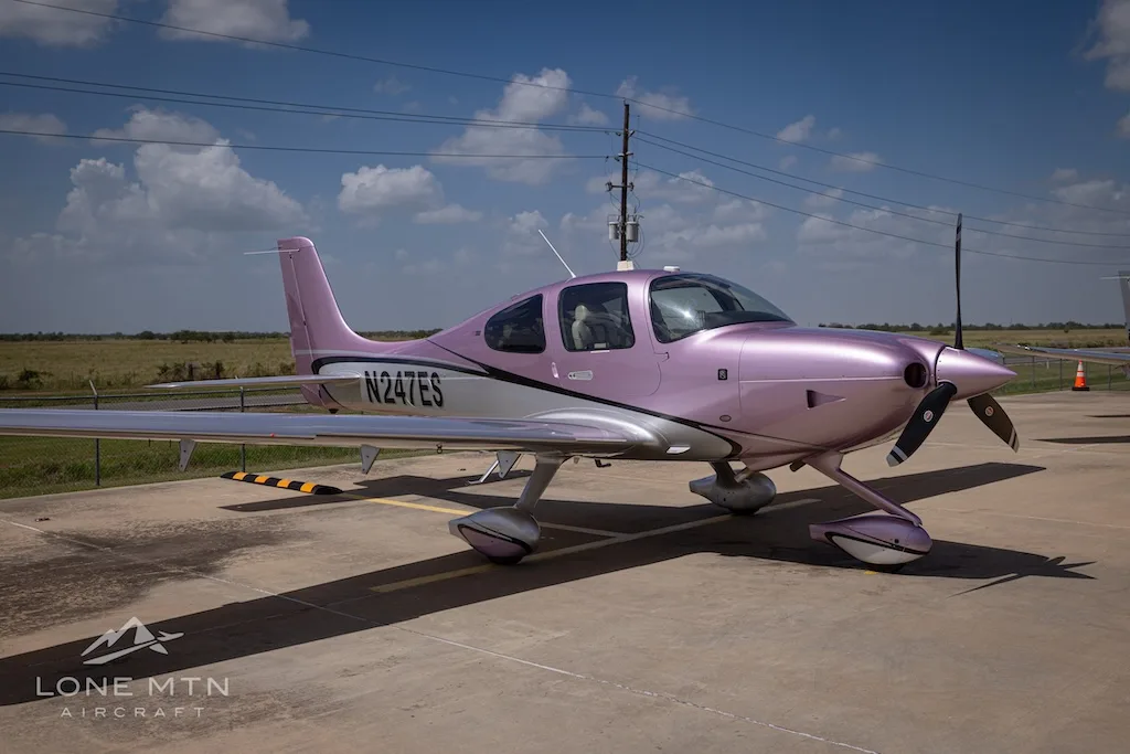 Exterior view of a 2024 Cirrus SR22 G7 GTS, N247ES.