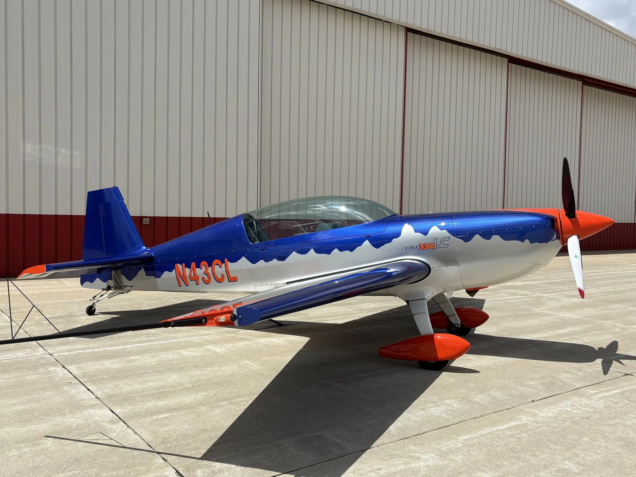 Exterior view of a 2010 EXTRA AIRCRAFT EA 300/L, N43CL.