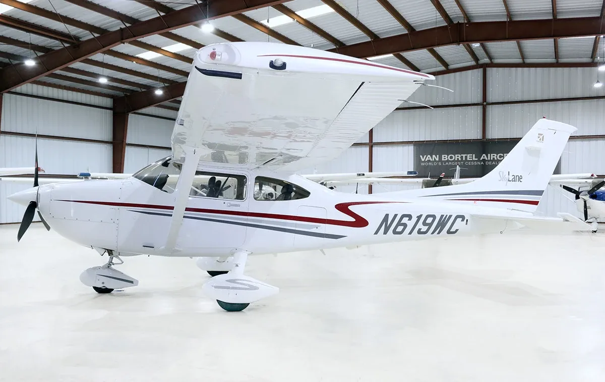 Exterior view of a Cessna Piston 182, N656JM.