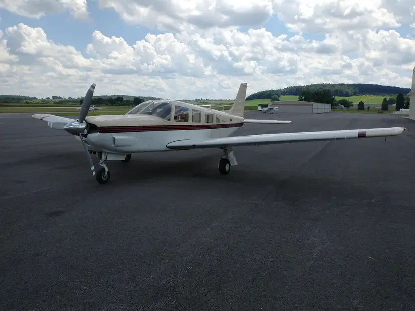 Exterior view of a 1997 Piper PA-28-181 Archer III.