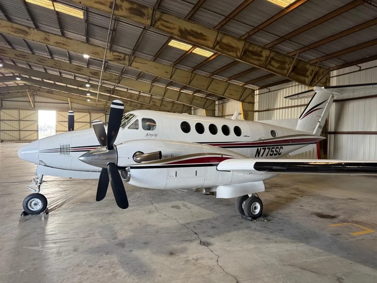Exterior view of a 1980 BEECHCRAFT KING AIR 200, N775SC.