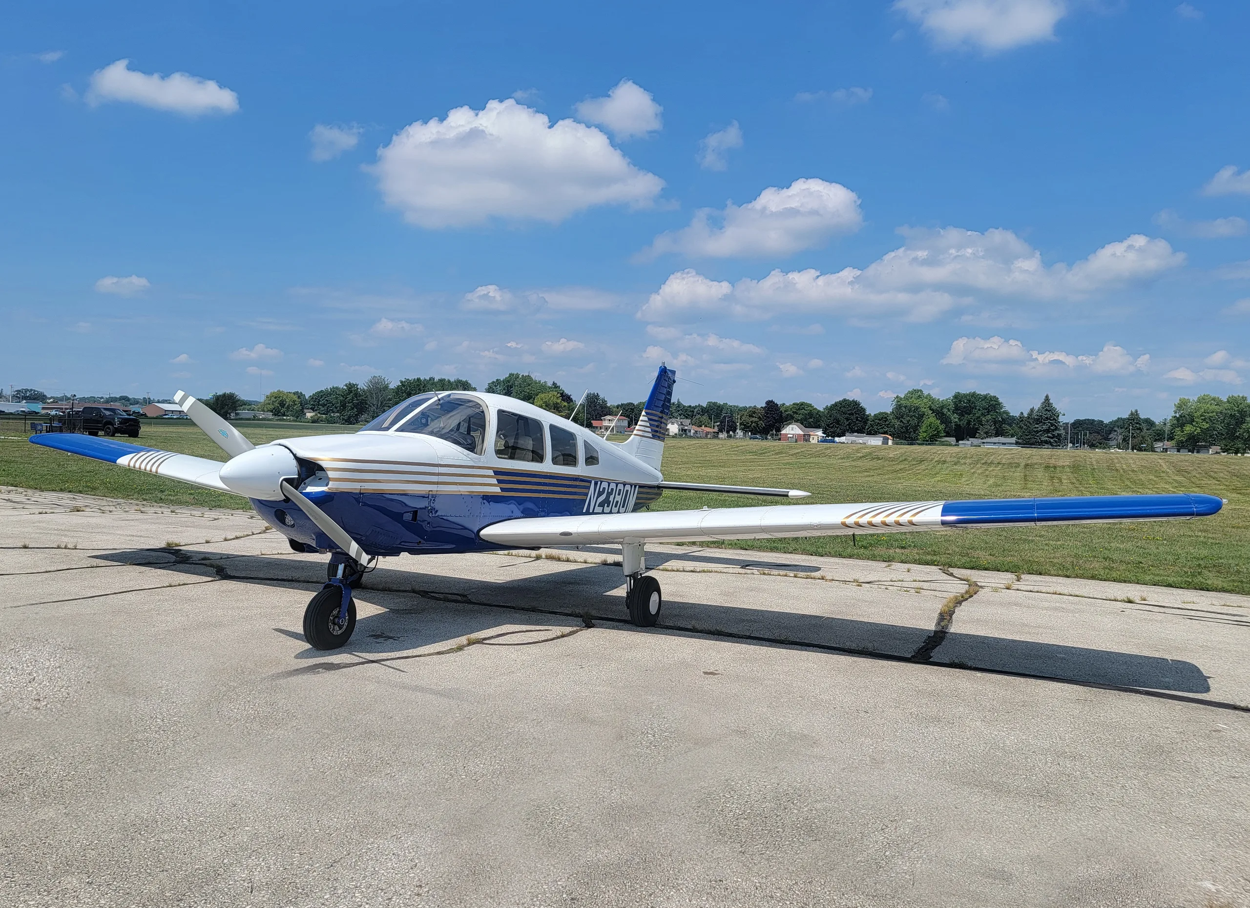 Exterior view of a Piper Archer, N2380M.