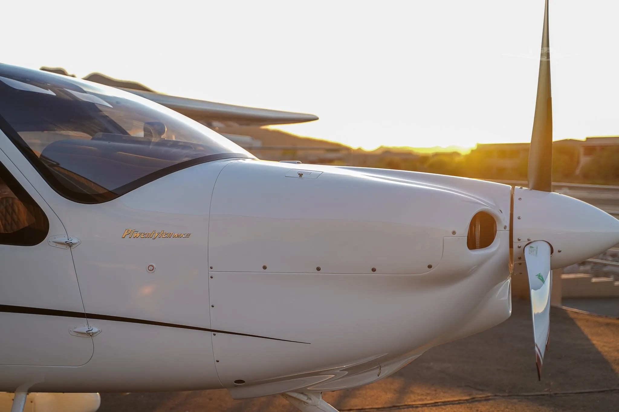 Exterior view of a 2021 TECNAM P2010 MKII, N253CM.