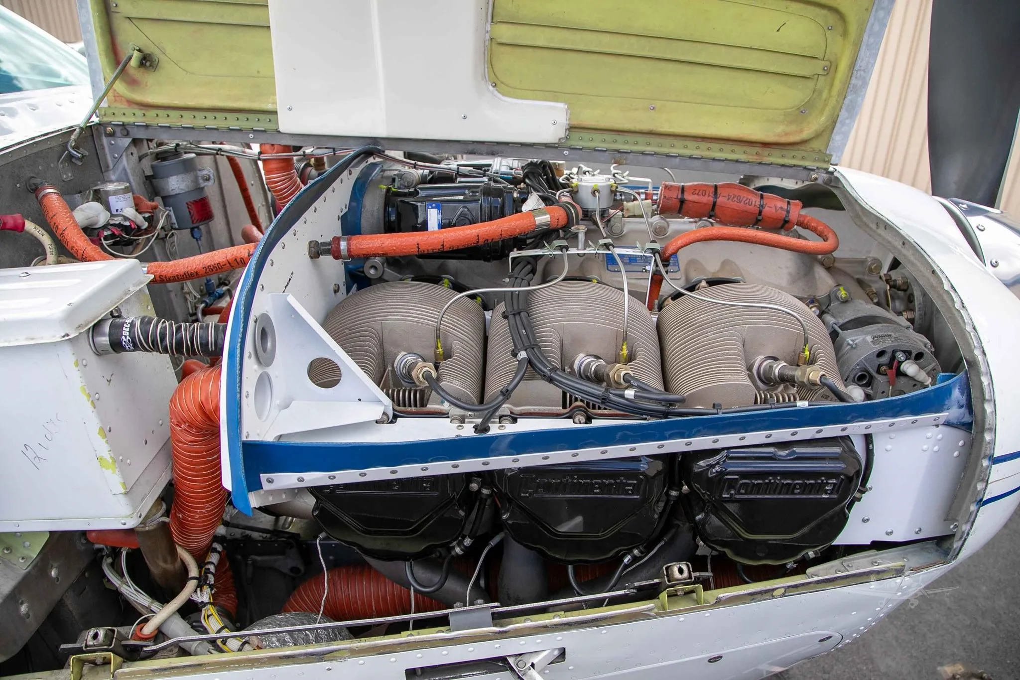 Engine detail of a 1976 BEECHCRAFT A36 BONANZA.