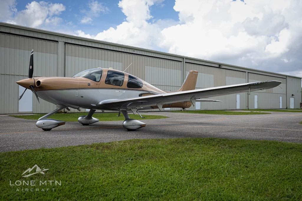 Exterior view of a 2023 Cirrus SR22 G6 GTS, N618JP.