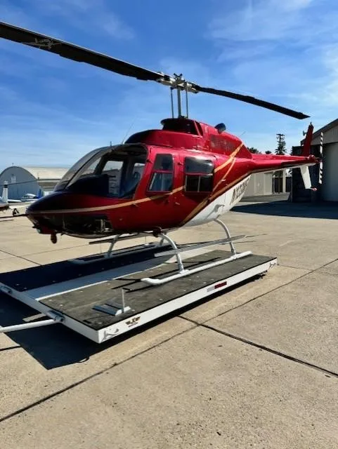 Exterior view of a 1980 BELL 206B III, N123WF.