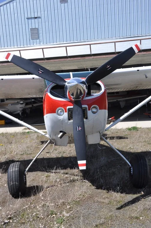 Exterior view of a 1973 Cessna 185F, N3370S.