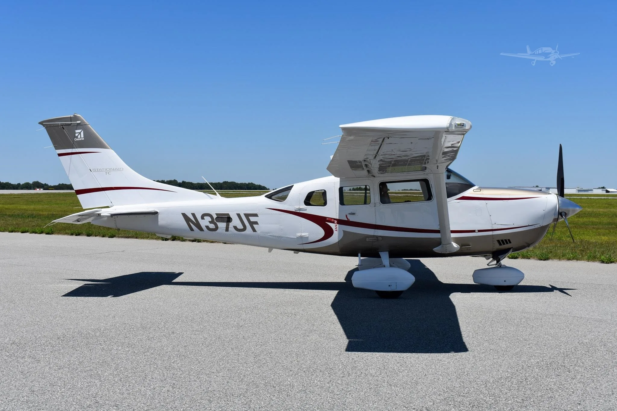 Exterior view of a 2009 CESSNA TURBO 206H STATIONAIR, N37JF.