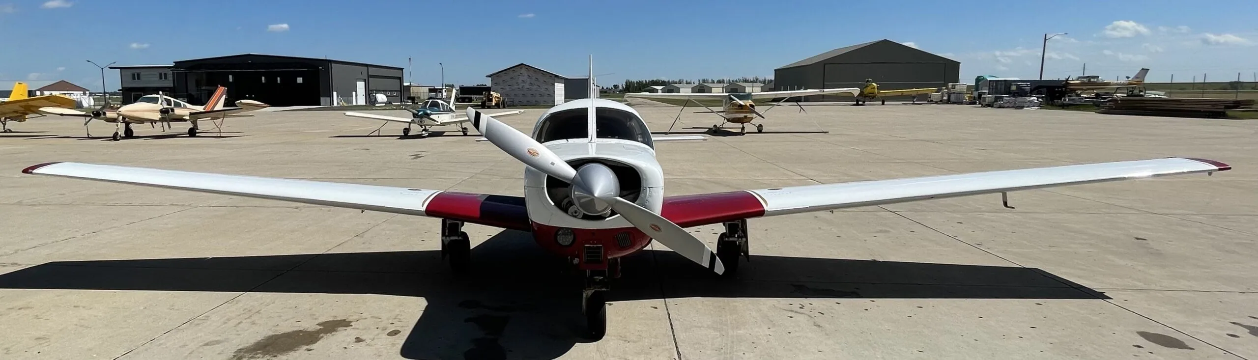 Exterior view of a 1967 Mooney M20C, N3203F.