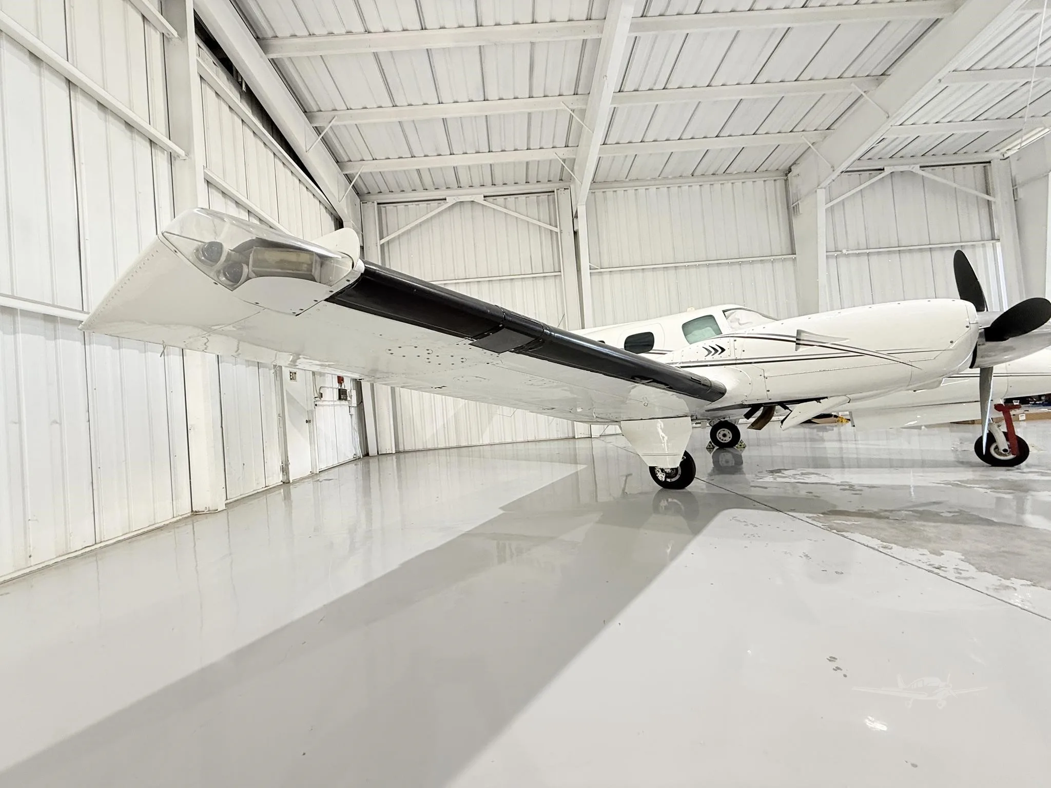 Exterior view of a 1971 BEECHCRAFT A60 DUKE, N7587D.