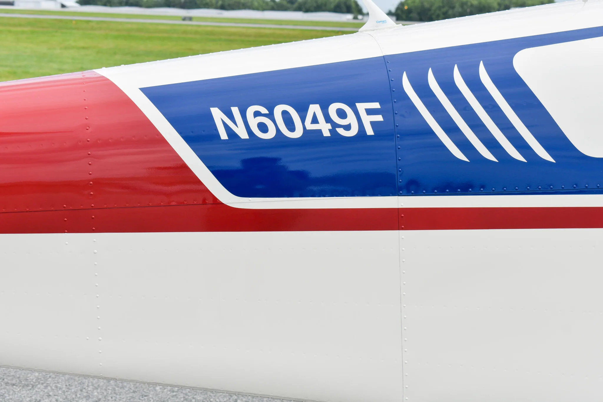 Marketing image of a 1965 Beechcraft S35 Bonanza.