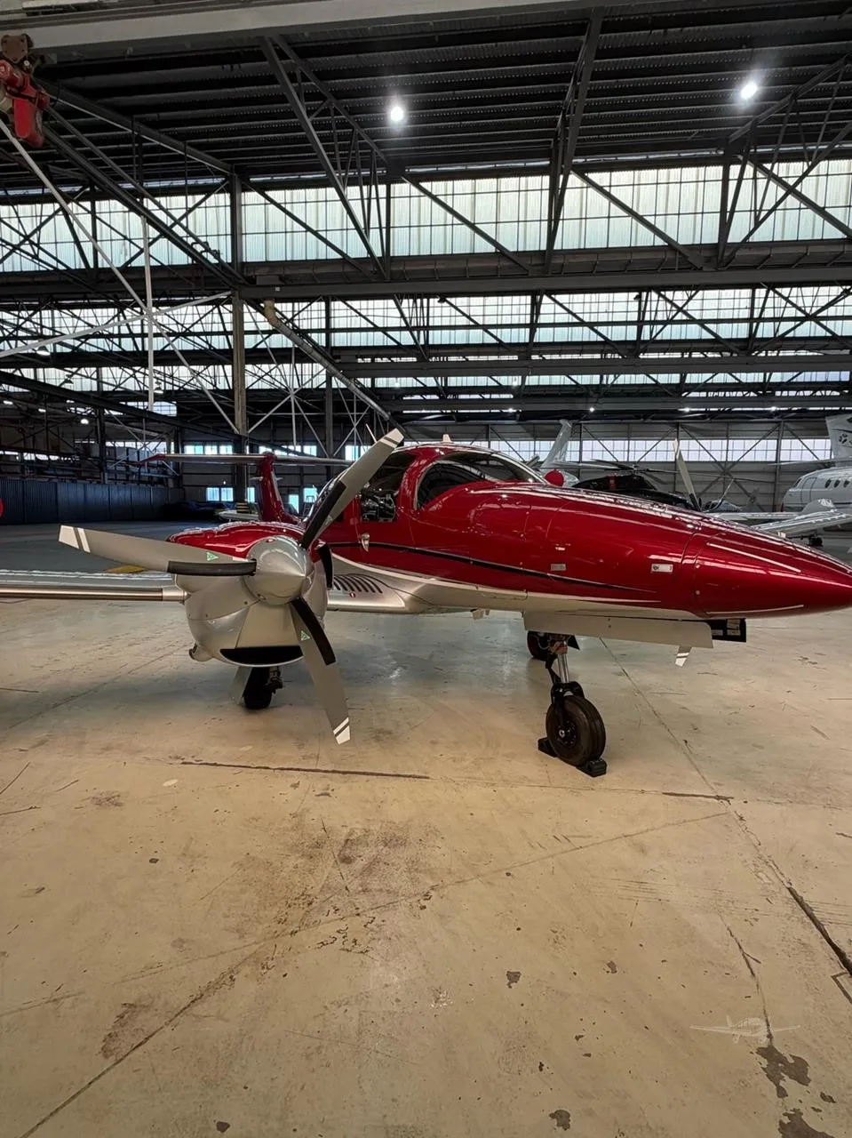 Exterior view of a 2022 DIAMOND DA62, VH-XWJ.