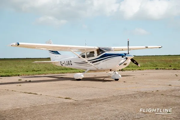 Exterior view of a 2005 Cessna 182T, G-IJAG.
