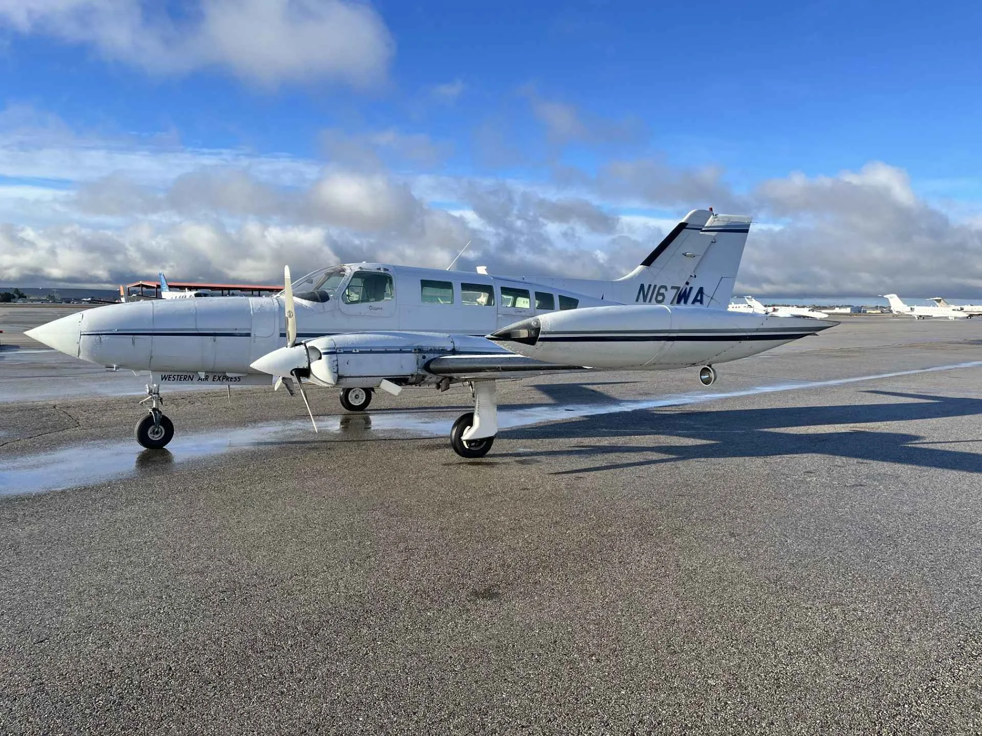 Exterior view of a 1976 Cessna 402B, N167WA.