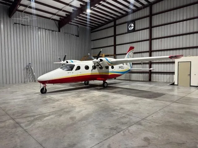 Exterior view of a 2022 TECNAM P2012 TRAVELLER, N401CJ.