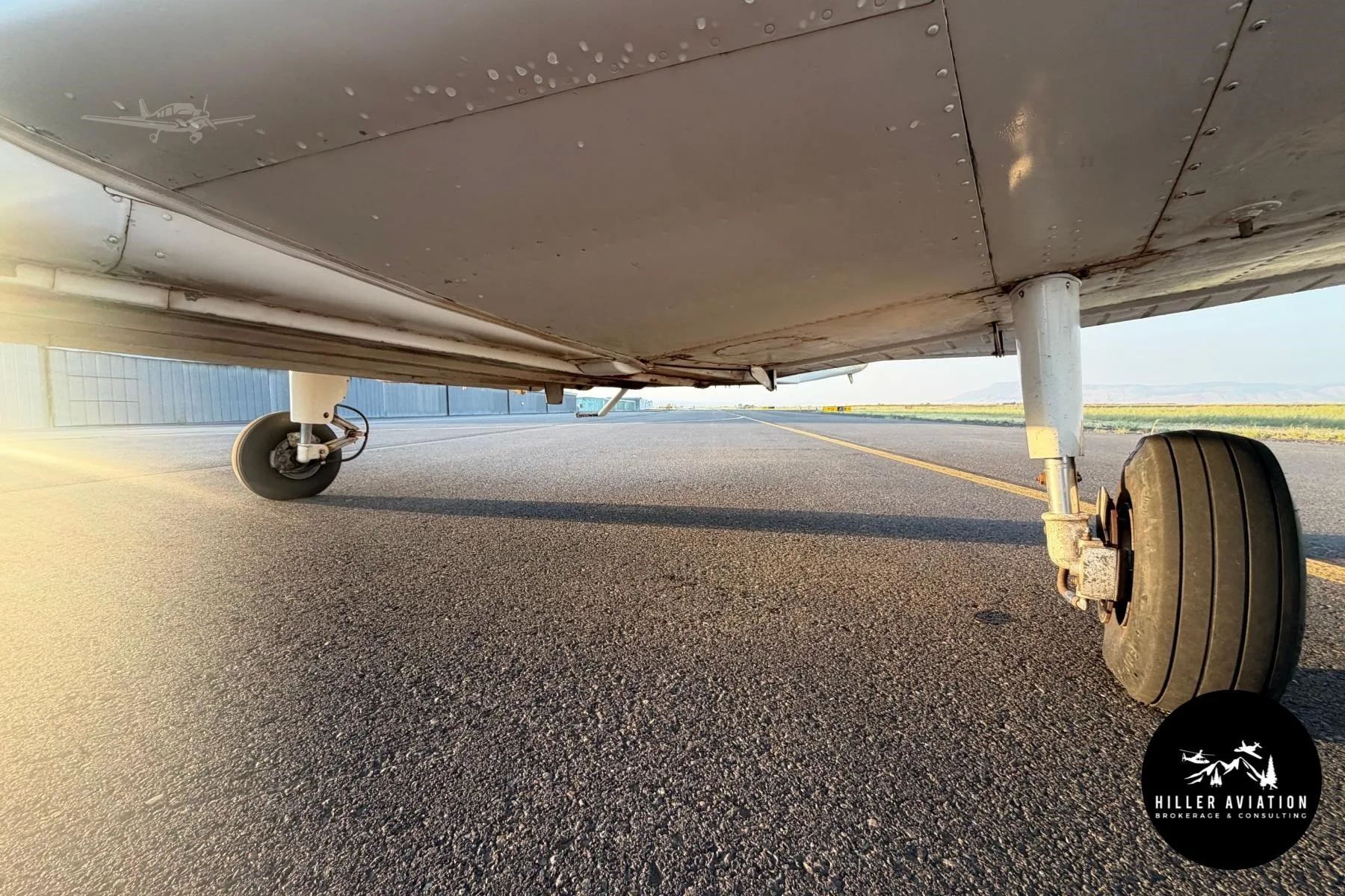 Exterior view of a 1966 PIPER CHEROKEE 140, N7030R.