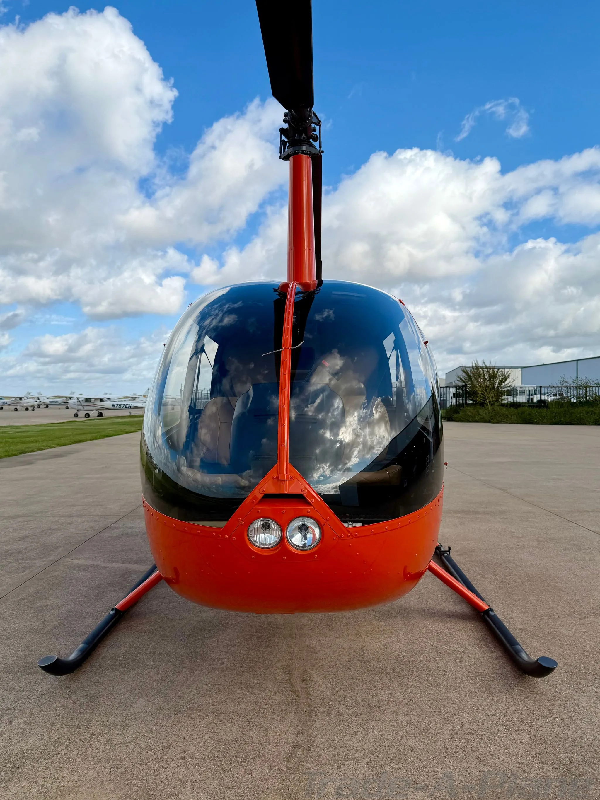 Exterior view of a 2015 ROBINSON R44 RAVEN II, N918BS.