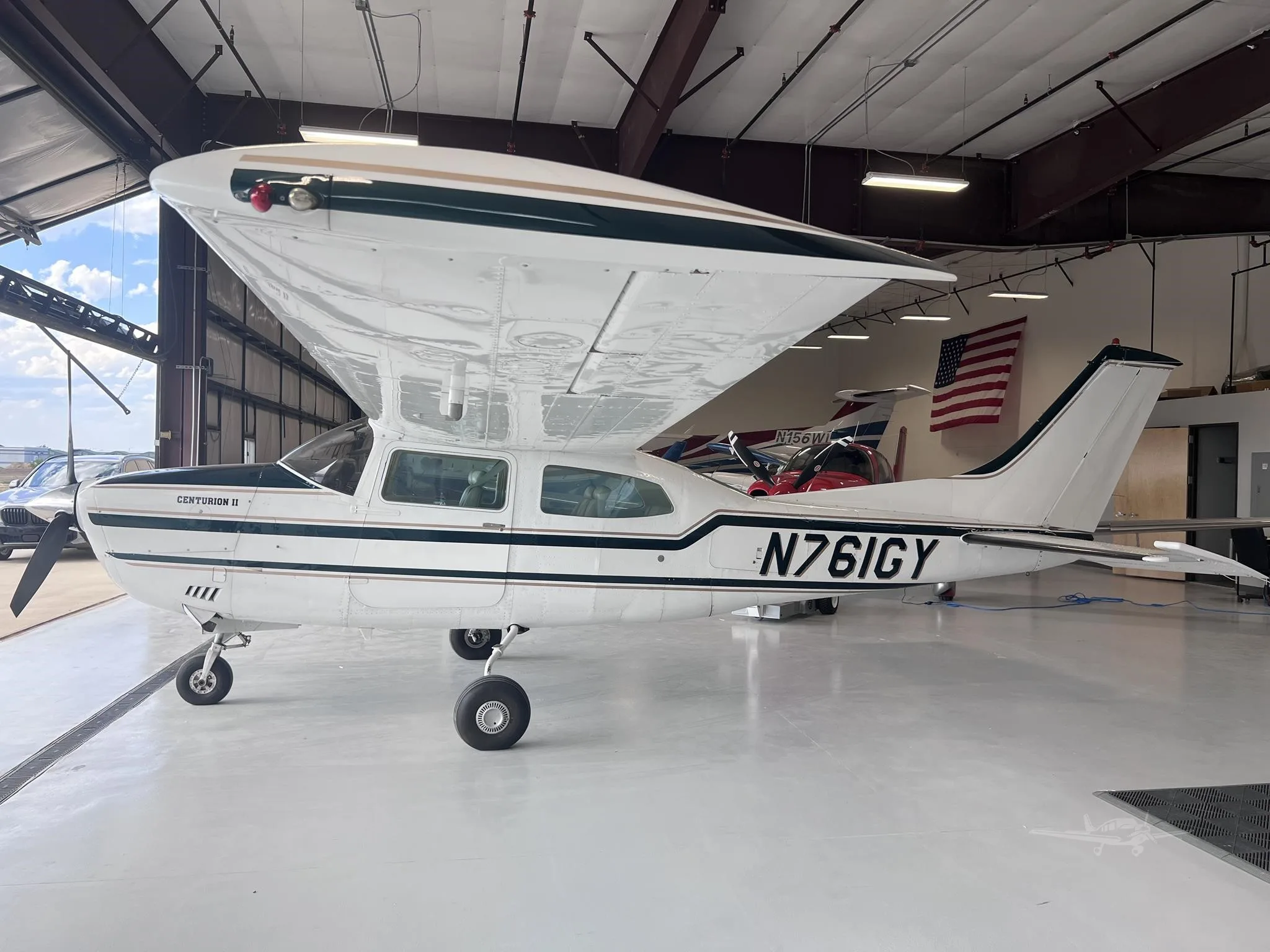 Exterior view of a 1977 CESSNA TURBO 210M, N761GY.