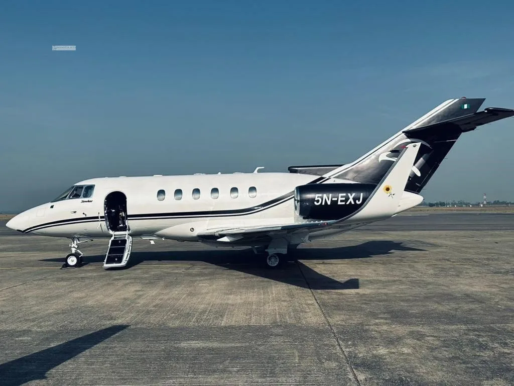 Exterior view of a 1997 HAWKER 800XP, 5N-EXJ.