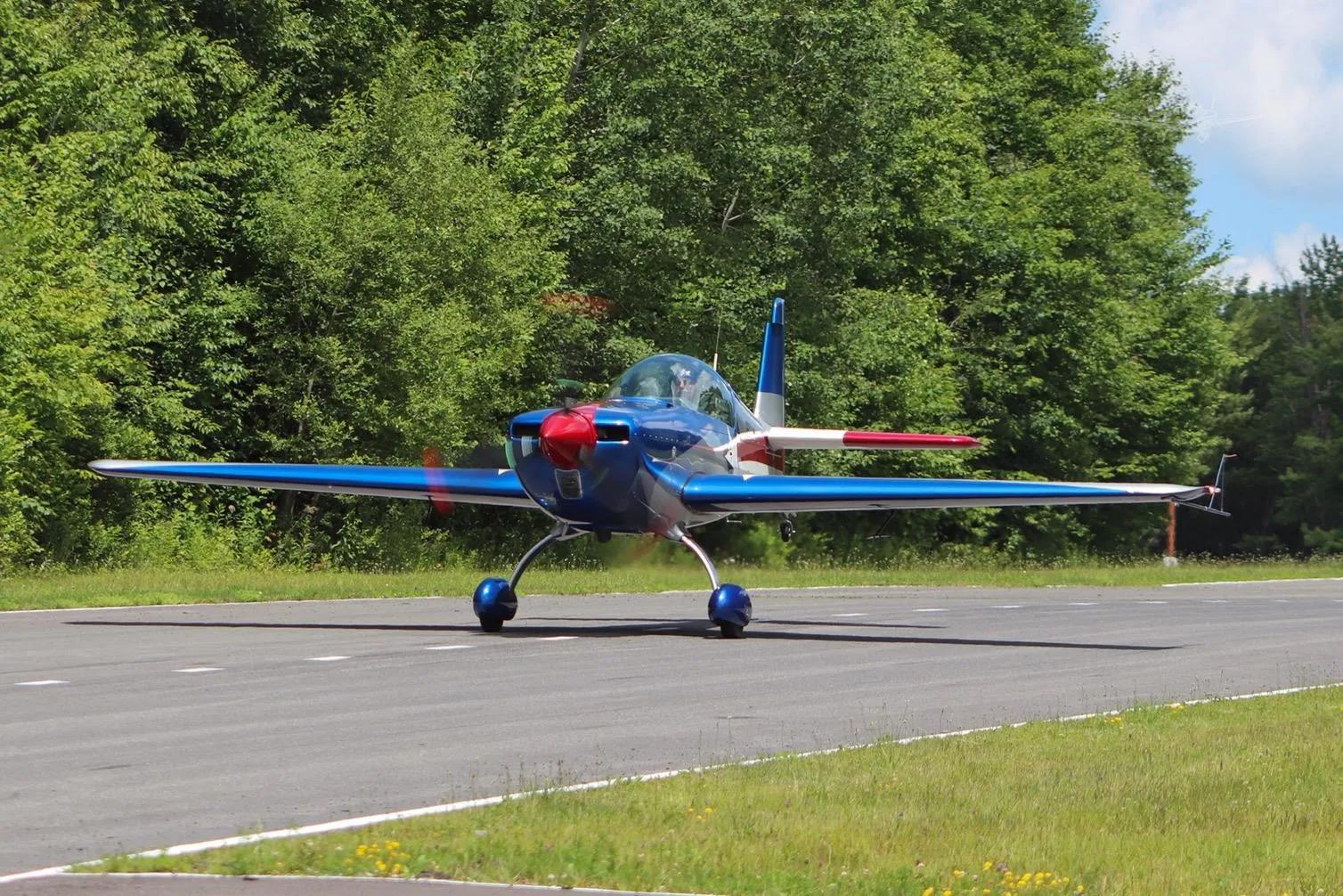 Exterior view of a 2014 EXTRA AIRCRAFT EA 330LT, N328LT.