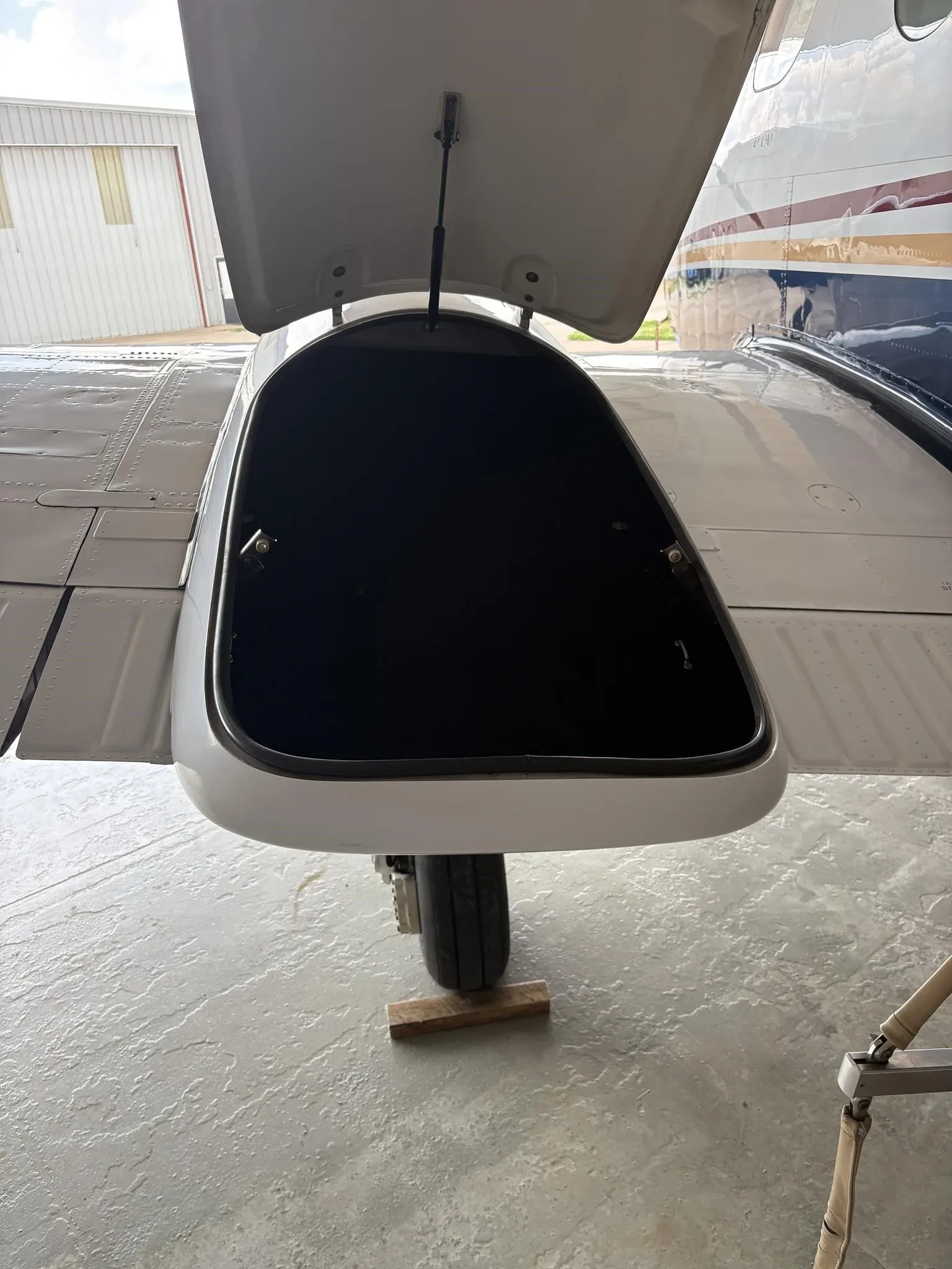 Exterior view of a 1976 BEECHCRAFT KING AIR C90, N711KP.