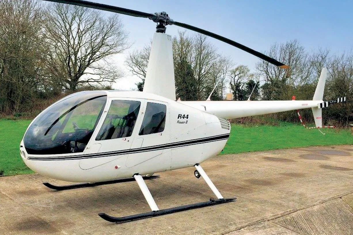 Marketing image of a 2010 ROBINSON R44 RAVEN II.
