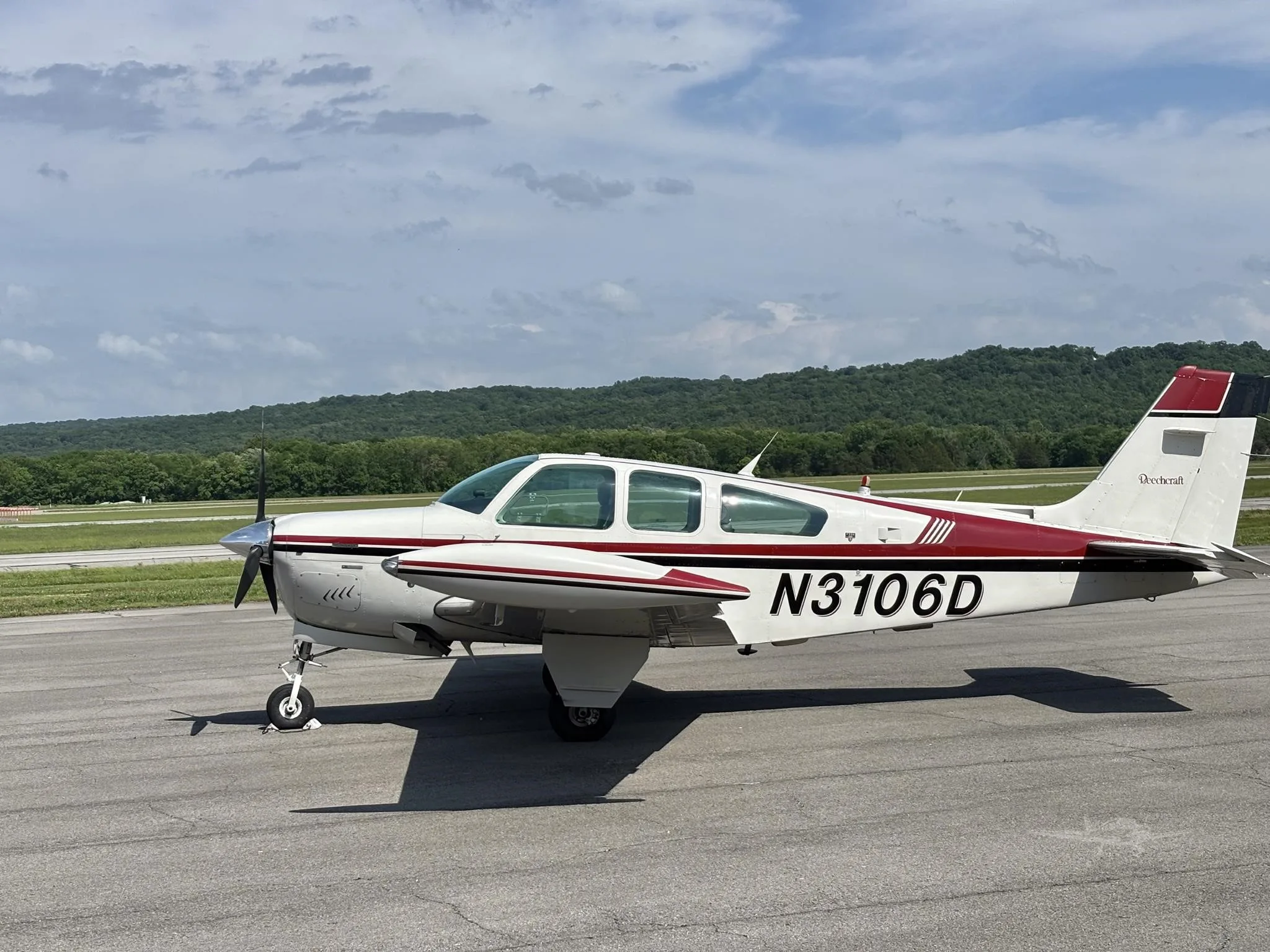 Exterior view of a 1988 BEECHCRAFT F33A BONANZA, N3106D.