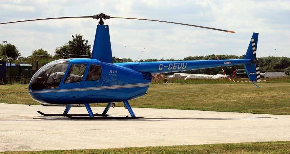 Exterior view of a 2002 Robinson R44 Raven II.