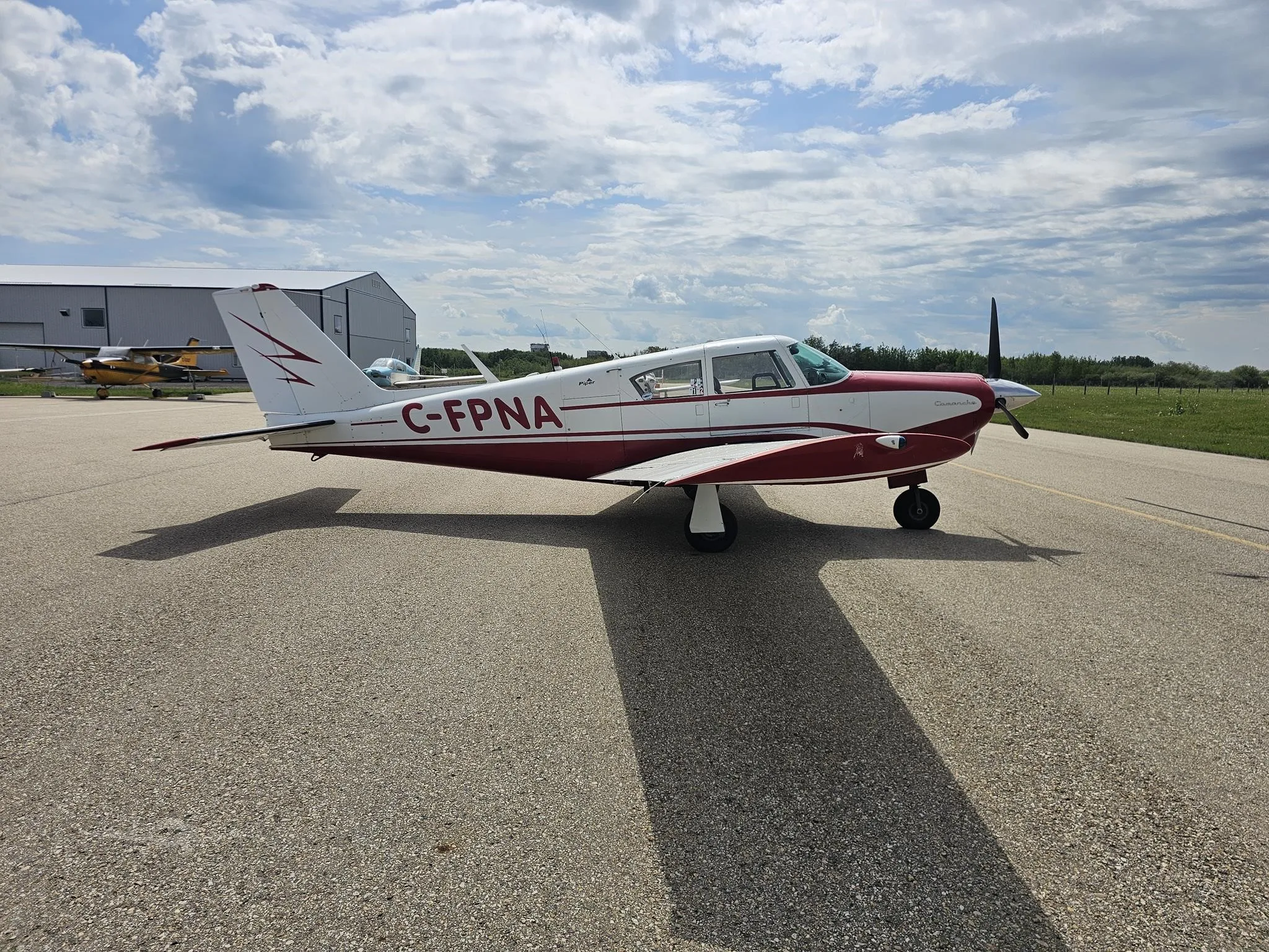 Exterior view of a 1963 PIPER COMANCHE 180, C-FPNA.