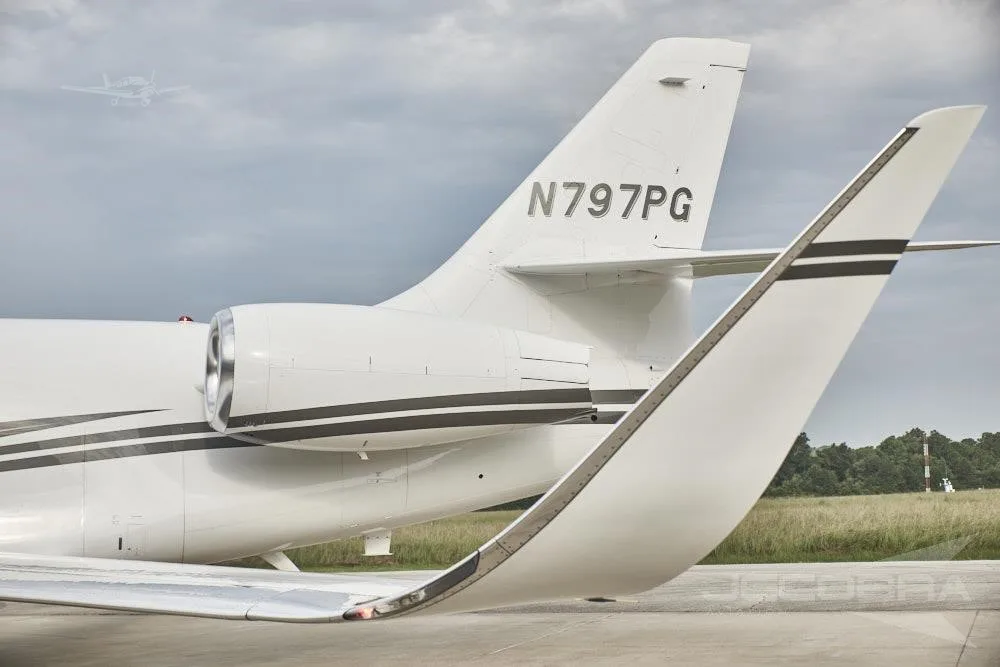 Exterior view of a 2006 DASSAULT FALCON 2000LX, N797PG.